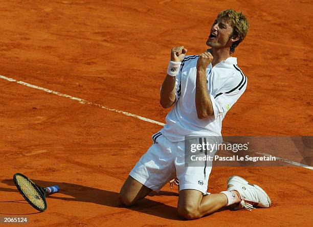 Juan Carlos Ferrero of Spain celebrates after winning his men's final match against Martin Verkerk of the Netherlands during the 14th day of the...