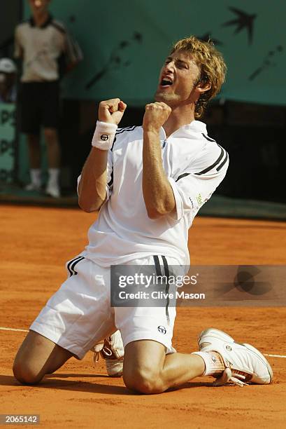 Juan Carlos Ferrero of Spain celebrates after winning his men's final match against Martin Verkerk of the Netherlands during the 14th day of the...