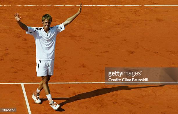 Juan Carlos Ferrero of Spain celebrates after winning his mens final match against Martin Verkerk of the Netherlands during the 14th day of the...