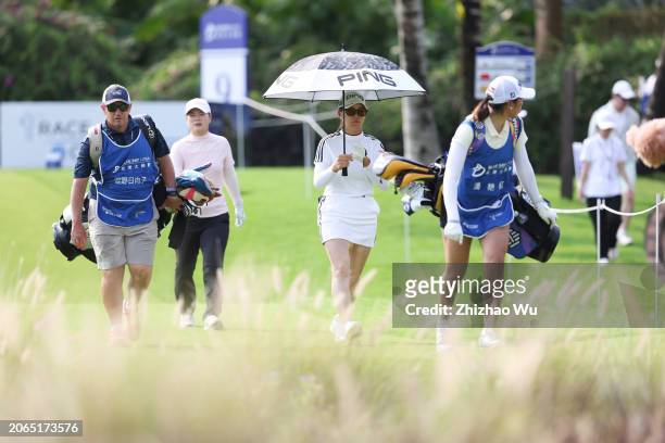 Hinako Shibuno of Japan walks on 9th hole during the first round of the Blue Bay LPGA at Jian Lake Blue Bay Golf Course on March 07, 2024 in Hainan...
