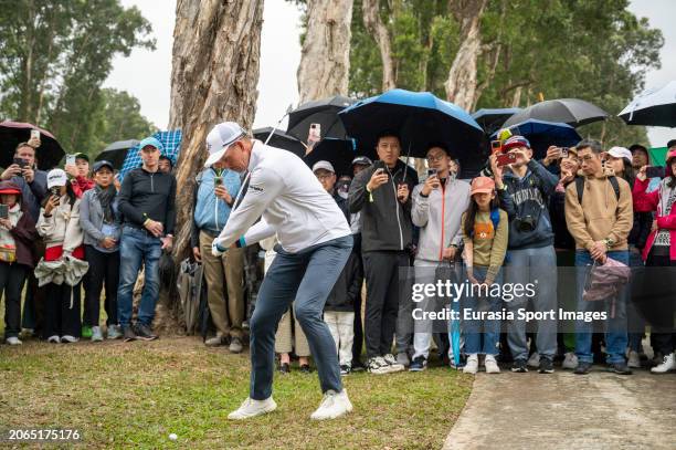 Henrik Stenson of Sweden plays an approach shot during day three of the LIV Golf Invitational - Hong Kong at The Hong Kong Golf Club on March 10,...