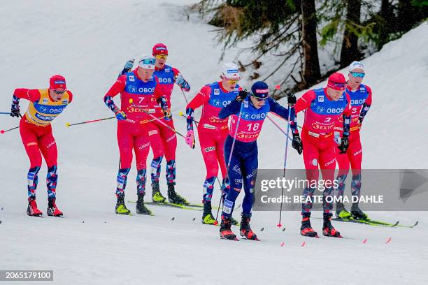 Italy's Federico Pellegrino together with Norway's Harald Oestberg Amundsen , Martin Loewstroem Nyenget , Norway's Johannes Hoesflot Klæbo and others...