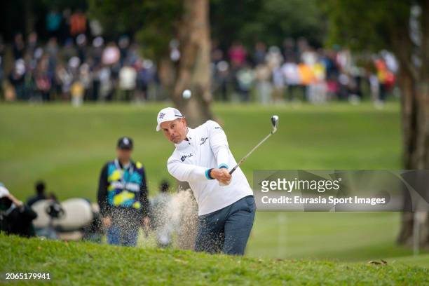 Henrik Stenson of Sweden plays an approach shot during day three of the LIV Golf Invitational - Hong Kong at The Hong Kong Golf Club on March 10,...