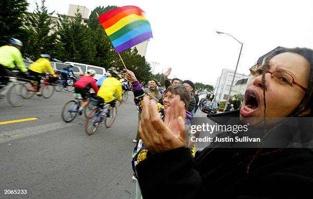 Diane Parker of Alameda, California, cheers cyclists at the beginning of the second annual AIDS/LifeCycle event June 8, 2003 in San Francisco,...