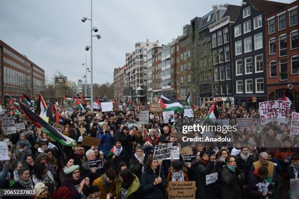 People stage a pro-Palestinian demonstration during the opening of the Holocaust Museum in Amsterdam, Netherlands on March 10, 2024. The Jewish...