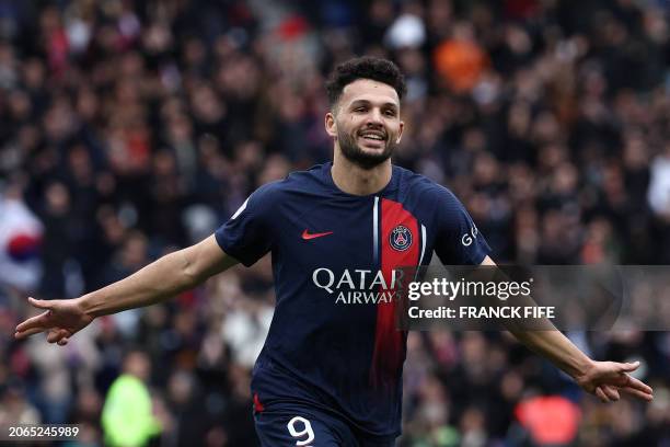 Paris Saint-Germain's Portuguese forward Goncalo Ramos celebrates after his team's second goal during the French L1 football match between Paris...