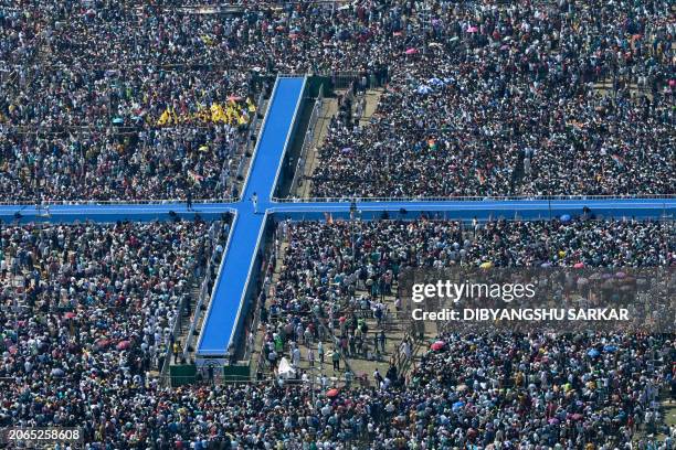 Activists of Trinamool Congress party attend a mass meeting addressed by party leader Mamata Banerjee, Chief Minister of India's West Bengal state...