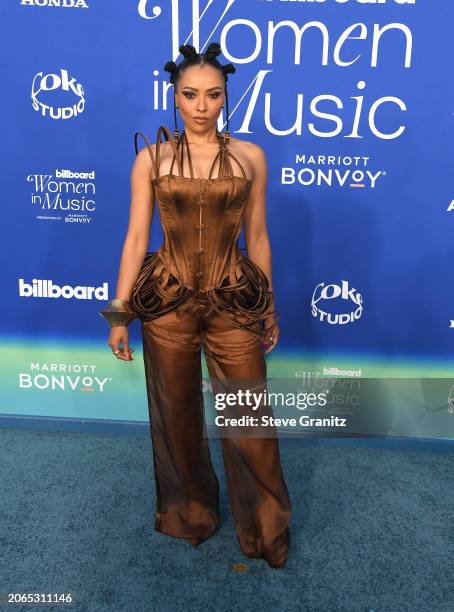 Kat Graham arrives at the 2024 Billboard Women In Music at YouTube Theater on March 06, 2024 in Inglewood, California.