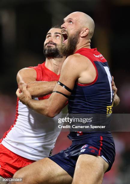 Brodie Grundy of the Swans and Max Gawn of the Demons contest for the ball during the Opening Round AFL match between Sydney Swans and Melbourne...