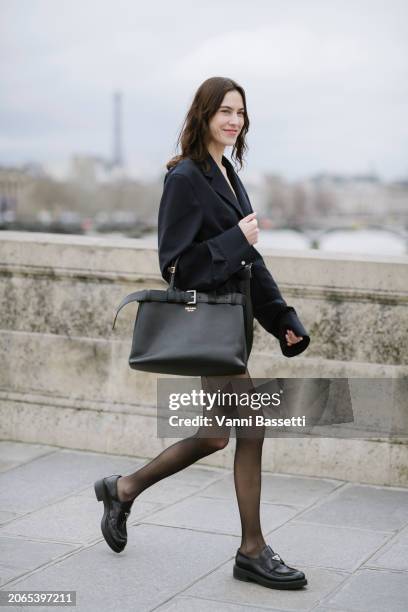 Alexa Chung wears Prada total look during the Womenswear Fall/Winter 2024/2025 as part of Paris Fashion Week on March 05, 2024 in Paris, France.