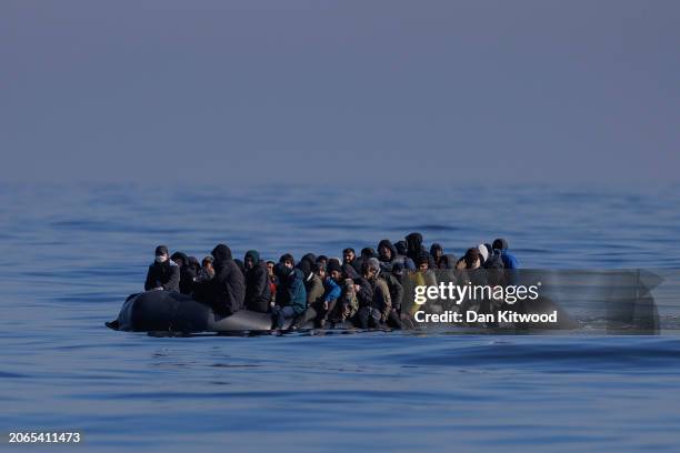 An inflatable dinghy carrying around 65 migrants crosses the English Channel on March 06, 2024 in the English Channel. According to official figures...