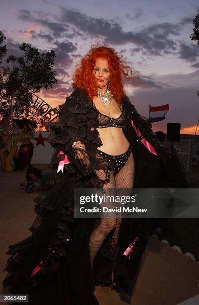 Septuagenarian stripper Tempest Storm poses after performing as a featured "living legend" at the Miss Exotic World Pageant at the Exotic World...