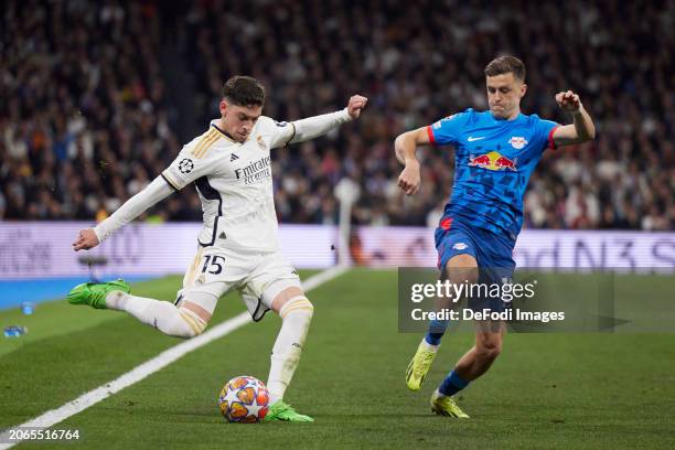 Madrid spain fede valverde of real madrid cf and christoph baumgartner of rb leipzig battle Madrid spain fede valverde of real madrid cf and christoph baumgartner of rb leipzig battle