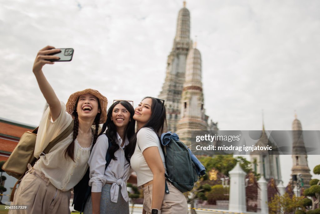 Tourists visiting Wat Arun, Bangkok