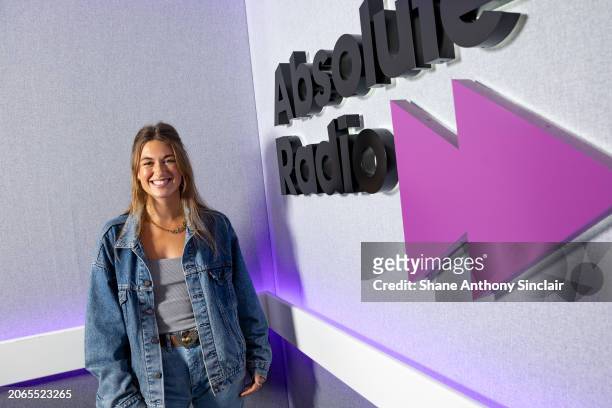 Lauren Watkins poses for a photograph as they visit Absolute Radio at Golden Square on March 07, 2024 in London, England.