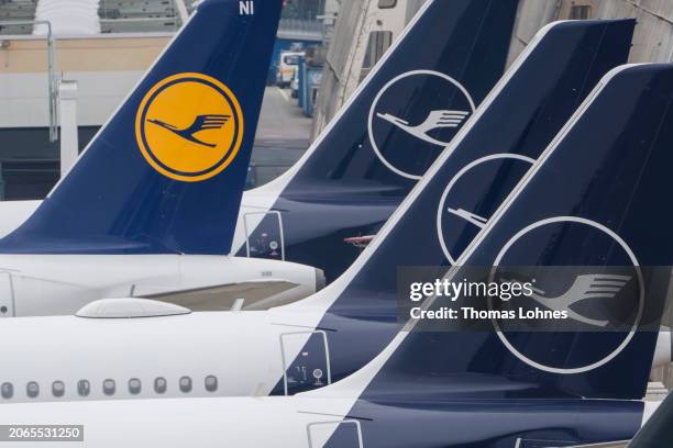 Lufthansa aircraft parked in front of a technical hangar at Frankfurt Airport during nationwide strike of Lufthansa ground employees on March 7, 2024...