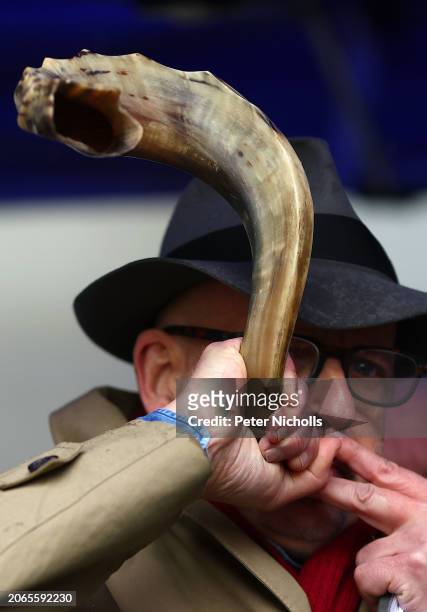 Participant blows a Shofar horn during The Blow For Hostages event at St John's Synagogue, on March 10, 2024 in London, England. With the war on Gaza...