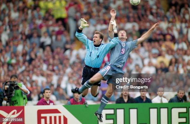 German footballer Andreas Kopke under pressure from British footballer Alan Shearer during the UEFA Euro 1996 semifinal match between England and...