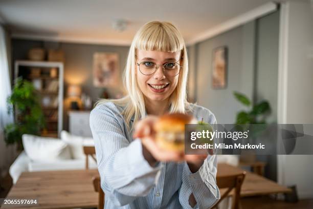 what to eat, a tasty burger or a healthy apple - meat forbidden stock pictures, royalty-free photos & images