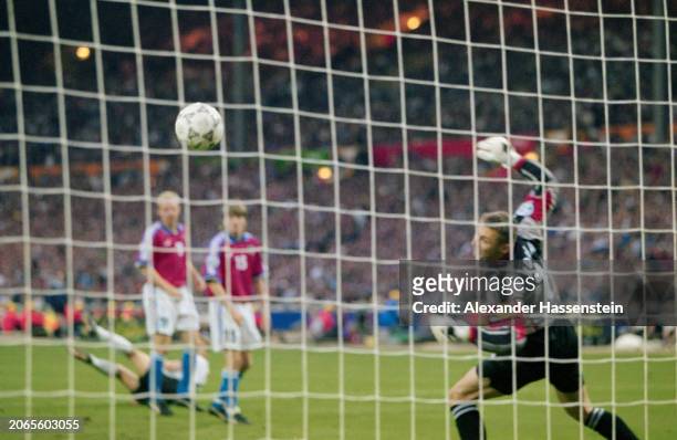 Czech footballer Petr Kouba fails to save Oliver Bierhoff's match-winning shot during the UEFA Euro 1996 final between the Czech Republic and...