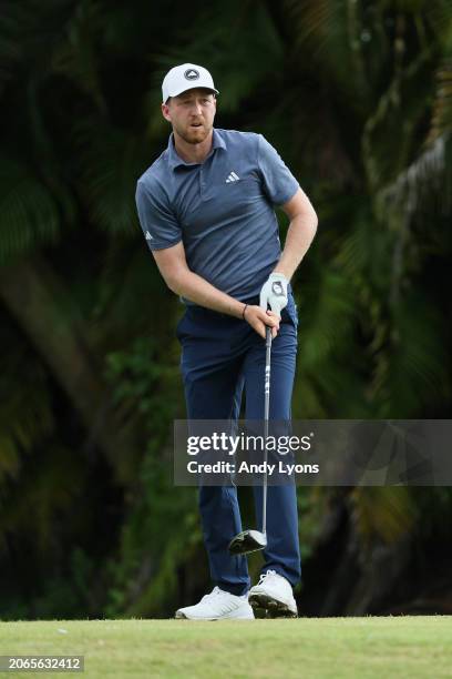 Daniel Berger of the United States watches his shot from the fourth tee during the first round of the Puerto Rico Open at Grand Reserve Golf Club on...