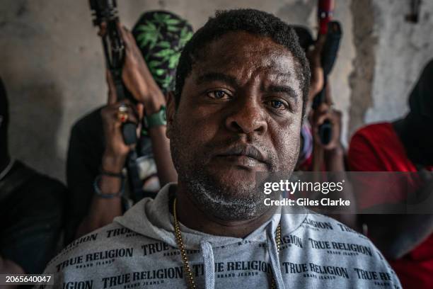 Gang Leader Jimmy 'Barbecue' Cherizier with G-9 federation gang members in the Delmas 3 area on February 22, 2024 in Port-au-Prince, Haiti. There has...