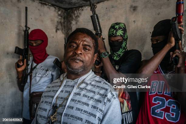 Gang Leader Jimmy 'Barbecue' Cherizier with G-9 federation gang members in the Delmas 3 area on February 22, 2024 in Port-au-Prince, Haiti. There has...