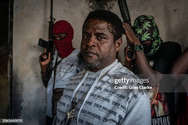 Gang Leader Jimmy 'Barbecue' Cherizier with G-9 federation gang members in the Delmas 3 area on February 22, 2024 in Port-au-Prince, Haiti. There has...