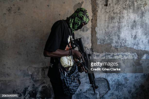 An armed gang member on February 22, 2024 in Port-au-Prince, Haiti. There has a been fresh wave of violence in Port-au-Prince where, according to UN...