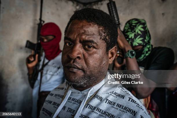 Gang Leader Jimmy 'Barbecue' Cherizier with G-9 federation gang members in the Delmas 3 area on February 22, 2024 in Port-au-Prince, Haiti. There has...