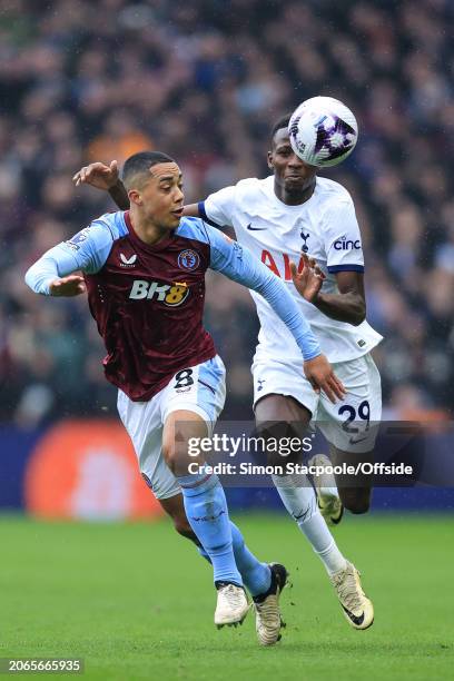 Youri Tielemans of Aston Villa and Pape Matar Sarr of Tottenham Hotspur during the Premier League match between Aston Villa and Tottenham Hotspur at...