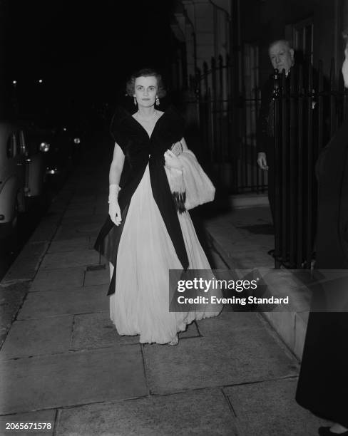 Margaret Campbell, Duchess of Argyll , wearing an evening dress and black shawl, July 27th 1953.