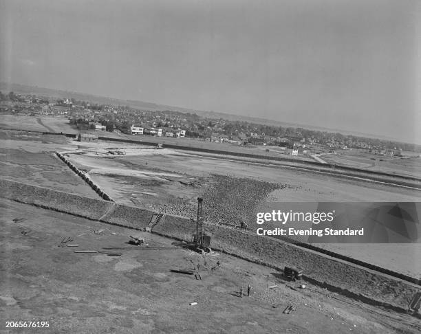 Aerial view of work being carried out to strenghten sea defences at Canvey Island in Essex, September 12th 1953. Canvey had suffered serious flood...