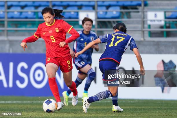 Lu Jiayu of China drives the ball during the second round match of the 2024 AFC U20 Women's Asian Cup Finals between China and Japan at JAR Stadium...