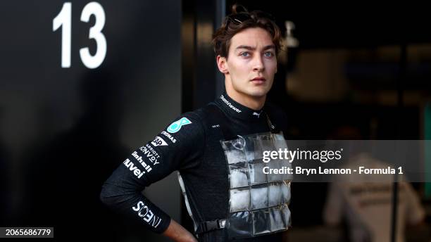 George Russell of Great Britain and Mercedes looks on in the Paddock during practice ahead of the F1 Grand Prix of Saudi Arabia at Jeddah Corniche...