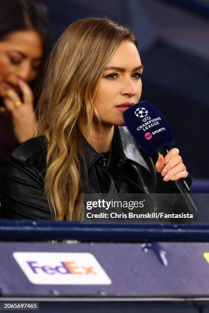 Laura Woods looks on during the UEFA Champions League 2023/24 round of 16 second leg match between Manchester City and F.C. Copenhagen at Etihad...