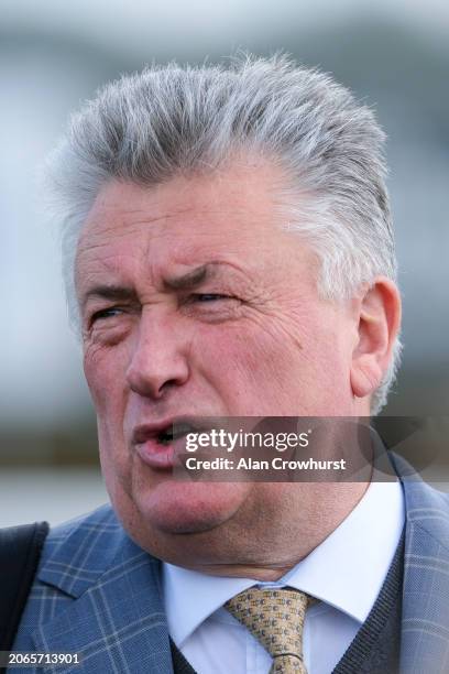 Paul Nicholls poses at Wincanton Racecourse on March 07, 2024 in Wincanton, England.