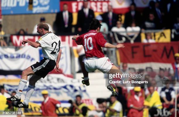 German footballer Dieter Eilts and Russian footballer Aleksandr Mostovoi in action during the UEFA Euro 1996 Group C match between Russia and...