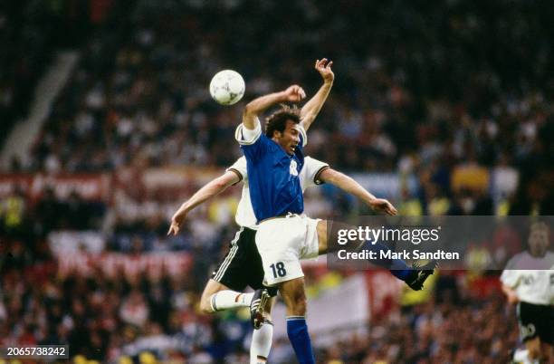 German footballer Thomas Helmer and Italian footballer Pierluigi Casiraghi in action during the UEFA Euro 1996 Group C match between Italy and...