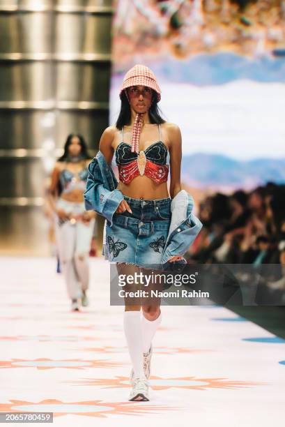 Model showcases designs by Ginny's Girl Gang during the Urban Oasis Runway at Melbourne Fashion Festival 2024 on March 07, 2024 in Melbourne,...