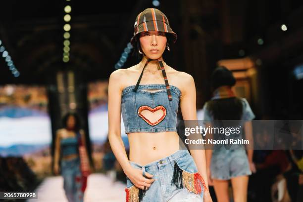 Model showcases designs by Ginny's Girl Gang during the Urban Oasis Runway at Melbourne Fashion Festival 2024 on March 07, 2024 in Melbourne,...