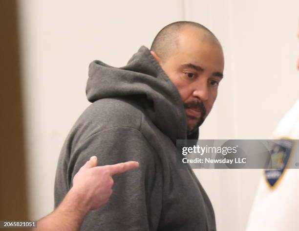 Steven Brown, 44-years-old, at First District Court, after being arraigned and released without bail at the courthouse in Central Islip, New York, on...