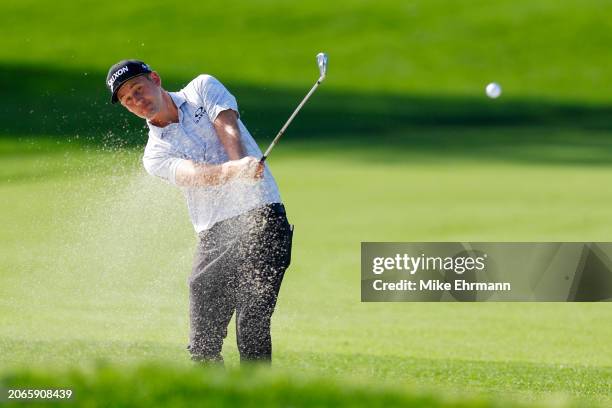 Andrew Putnam of the United States hits out of a fairway bunker on the first hole during the first round of the Arnold Palmer Invitational presented...