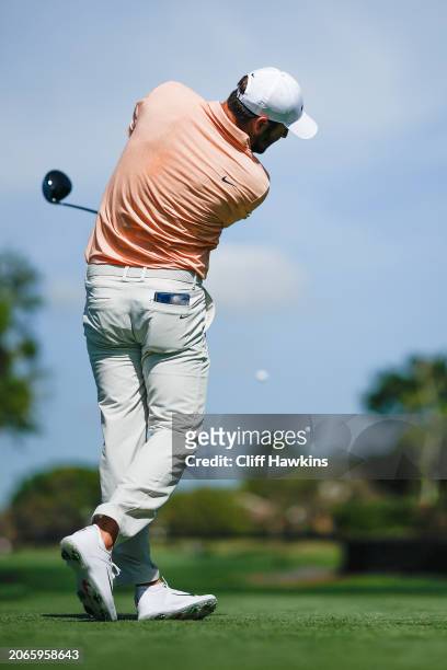 Scottie Scheffler of the United States hits a tee shot on the fourth hole during the first round of the Arnold Palmer Invitational presented by...