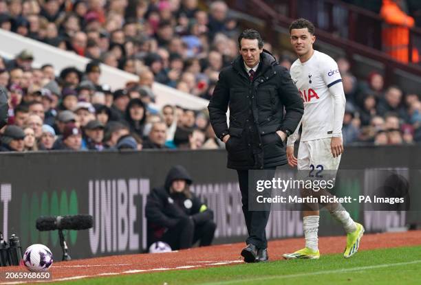 Aston Villa manager Unai Emery kicks the ball away from Tottenham Hotspur's Brennan Johnson during the Premier League match at Villa Park,...