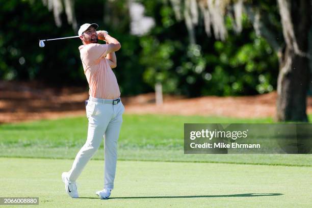 Scottie Scheffler of the United States hits an approach shot on the first hole during the first round of the Arnold Palmer Invitational presented by...