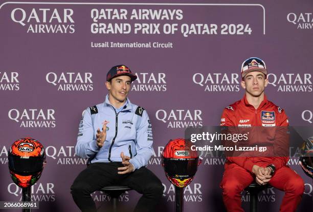 Marc Marquez of Spain and Gresini Racing MotoGP speaks and Pedro Acosta of Spain and Red Bull GasGas Tech3 looks on during the press conference...