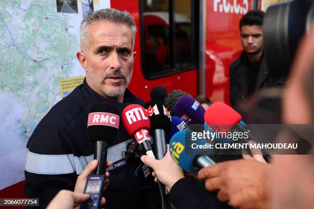 Lieutenant-Colonel Olivier Tudela of the Gard firefighters, in charge of the rescue operations, brief the media with updates on the ongoing search...