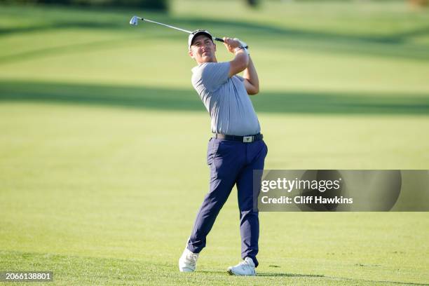 Justin Lower of the United States hits an approach shot on the first hole during the first round of the Arnold Palmer Invitational presented by...