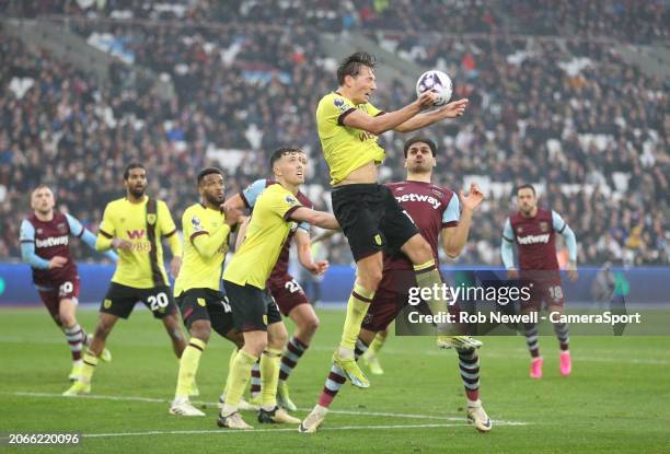 Burnley's Sander Berge heads clear under pressure from West Ham United's Konstantinos Mavropanos, there was an appeal for handball but not given...